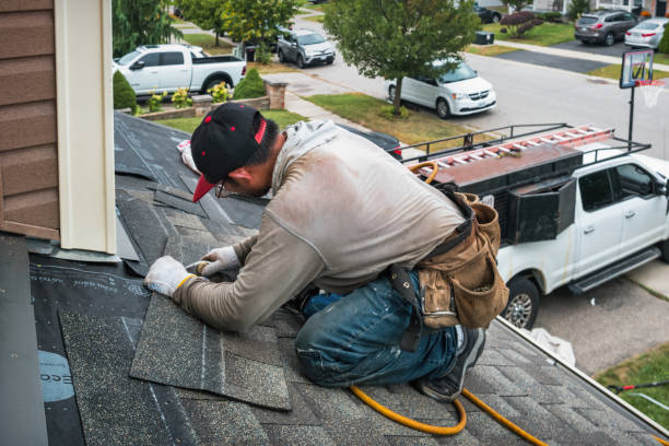 Professional Roofing technician working in Camano Island, WA
